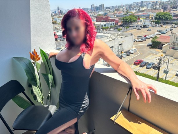 busty-redhead-vixen-big-0